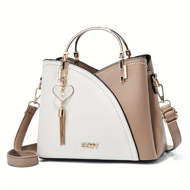 "Elegante luxe leren handtas met stijlvol kleurblokontwerp en kwastjes, perfect voor de moderne vrouw, frontaal gezien."
