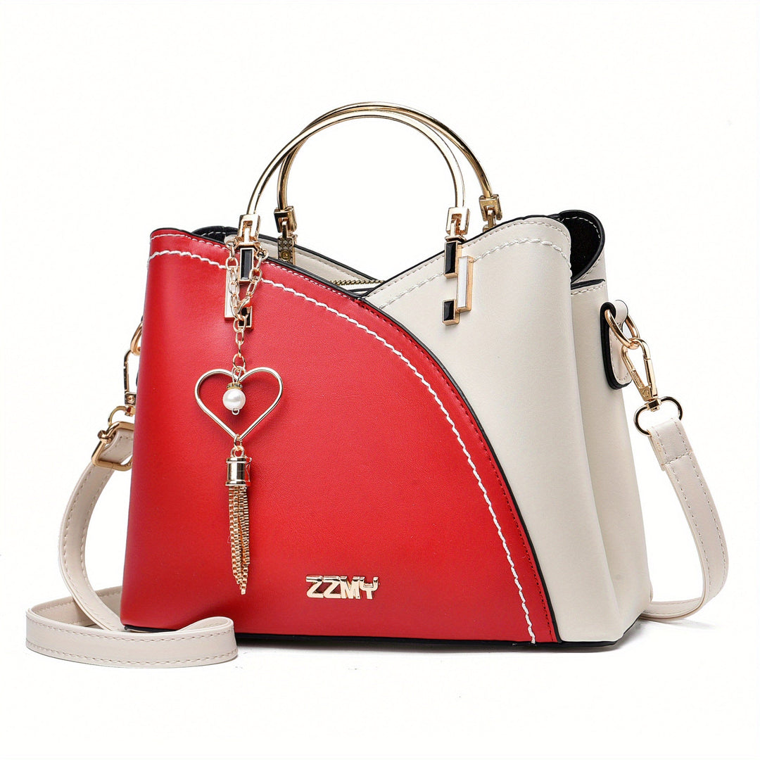 "Elegante luxe leren handtas met stijlvol kleurblokontwerp en kwastjes, perfect voor de moderne vrouw, frontaal gezien."