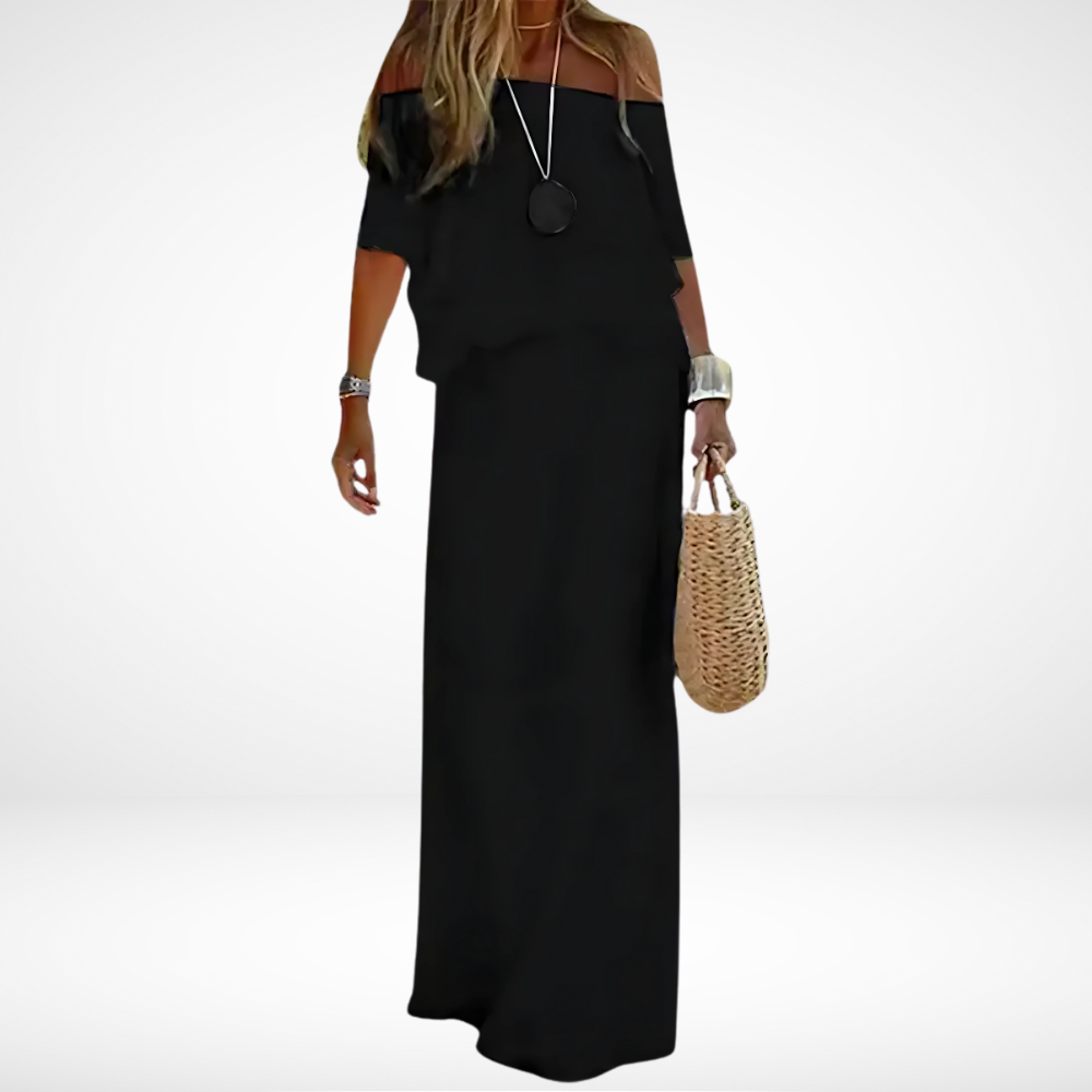 "Elegante maxi strandjurk in boho stijl, off-shoulder met V-hals en vetersluiting, luchtige chiffonstof."