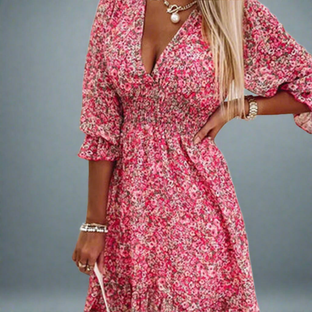 Elegante midi zomerjurk dames, V-hals, korte mouwen. Comfortabel en veelzijdig voor warme dagen.