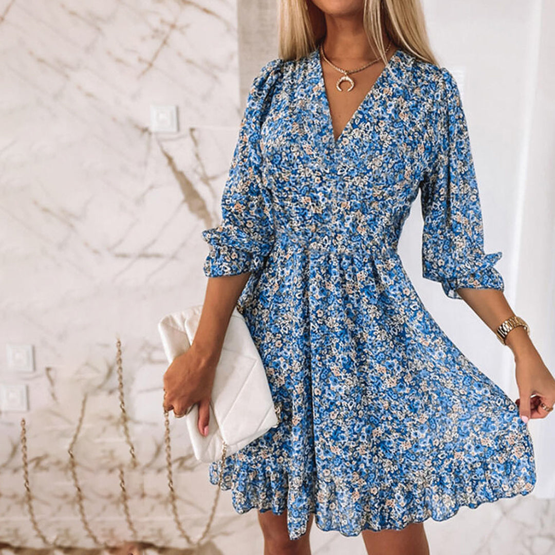 De ideale midi zomerjurk voor dames: elegant, V-hals en korte mouwen. Essentiële zomeroutfit.