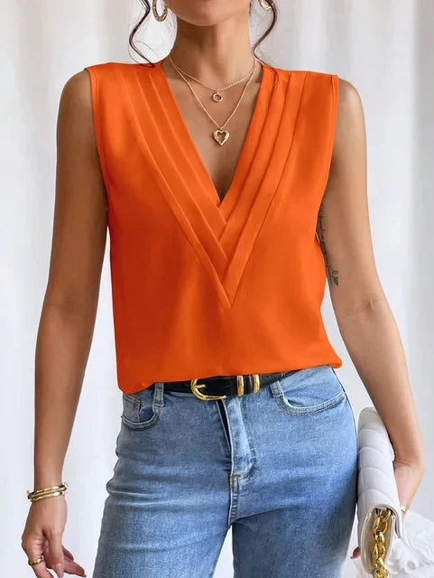 Zomerse damesblouse V-hals mouwloos, luchtig en chic voor elke gelegenheid.