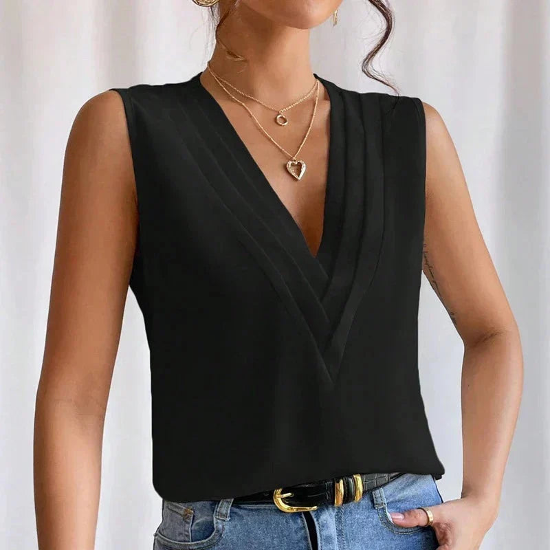 Veelzijdige damesblouse mouwloos met V-hals, comfortabel en modieus voor overdag en 's avonds.