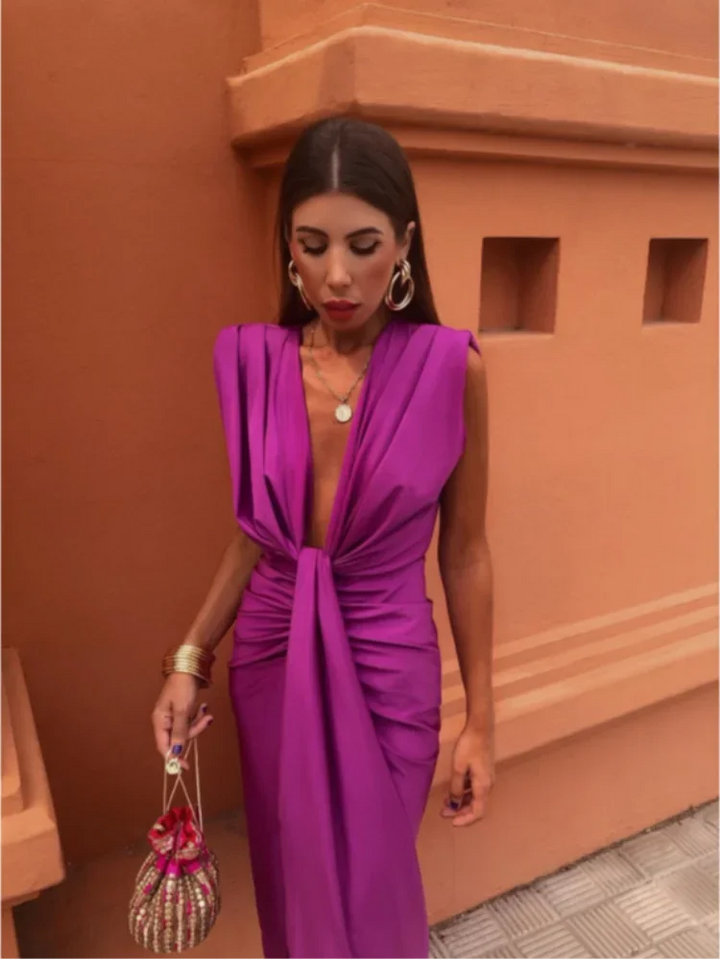 Trendy dames cocktailjurk en zomerjurk. Mouwloze V-hals midi jurk, ideaal voor feestjes en gala's.