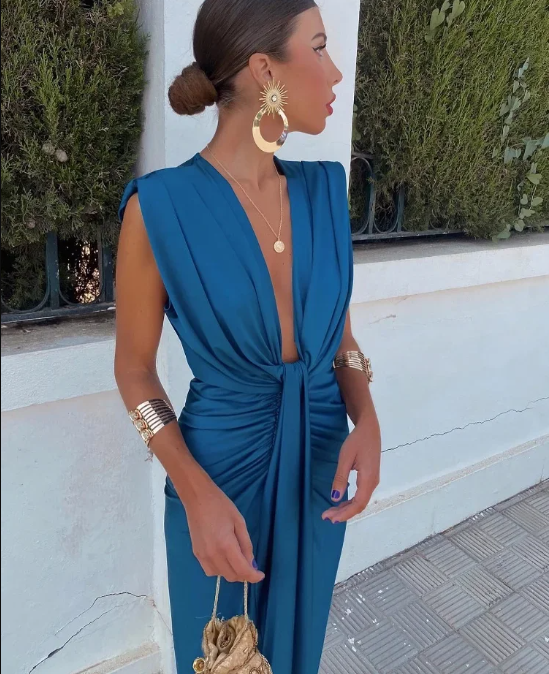 Dames elegante midi jurk met V-hals, mouwloos. Perfect als feestjurk, galajurk of avondjurk voor speciale gelegenheden.