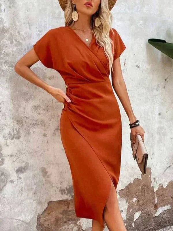 Comfortabele oranje zomerjurk voor vrouwen met elegante V-hals en korte mouwen, een stijlvolle casual midi jurk.