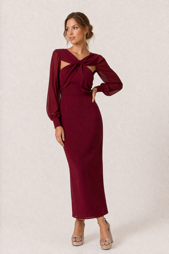 Vrouwelijke rode midi-jurk met stijlvol knoopdetail en lange mouwen, ideaal voor een casual of feestelijke look.