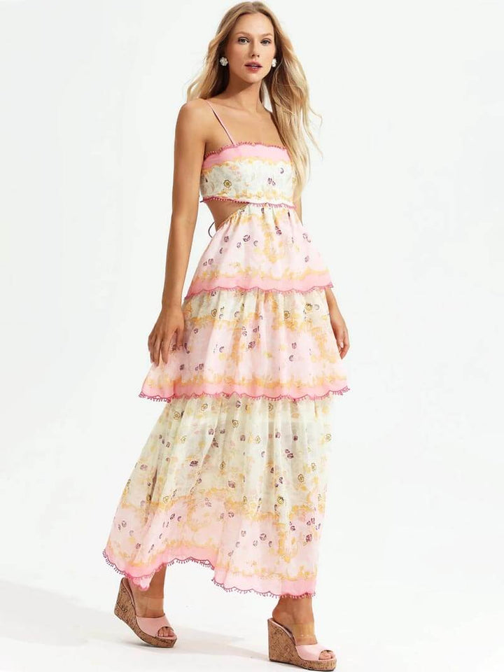 Veelzijdige roze dames maxi-jurk, geschikt als feest- of strandjurk, met ruches en borduurseldetails.