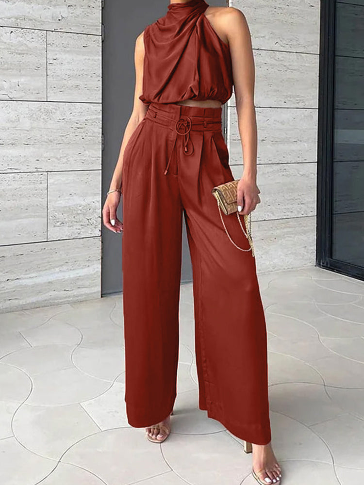 Moderne dames set: chique haltertop en wijde broek met hoge taille, veelzijdig voor elke gelegenheid.