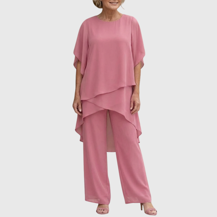 Stijlvolle tweedelige dames set, ook verkrijgbaar in grote maten, met palazzo broek en elegante drapering.