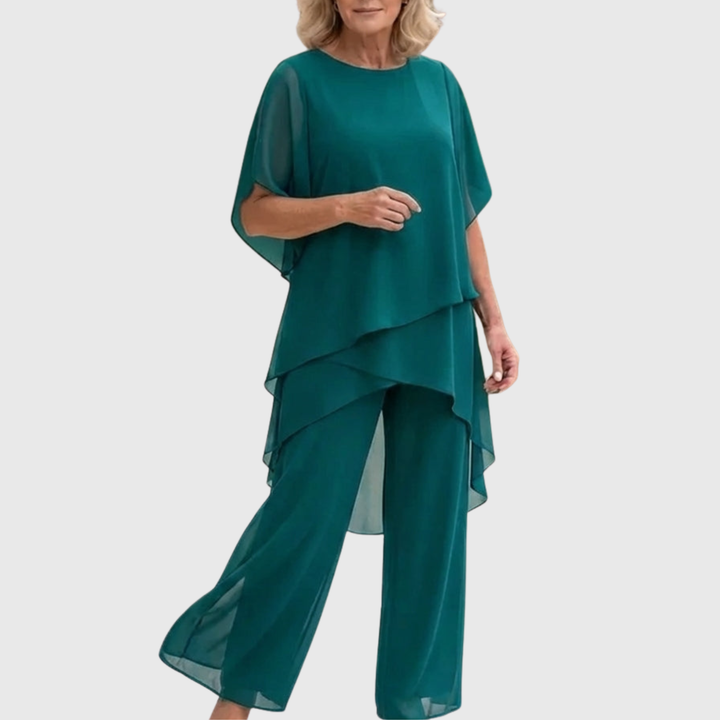 Comfortabele palazzo broek van de tweedelige dames set met elegante drapering. Voor een chique look.