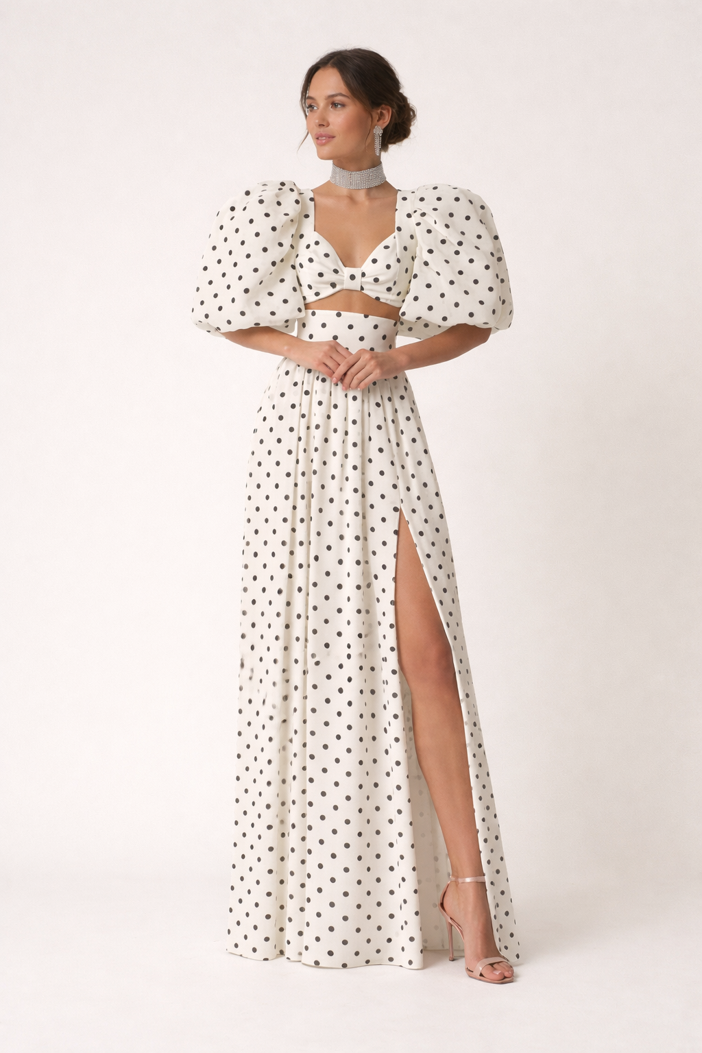Elegante tweedelige dames topset met pofmouwen en een zwierige maxirok, perfect voor feestjes.