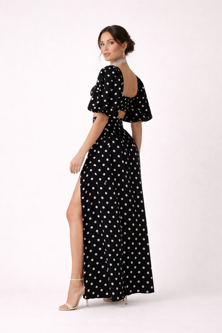 Comfortabele elegante dames topset met pofmouwen en bolletjesprint maxirok. Perfect voor feestjes en speciale gelegenheden.