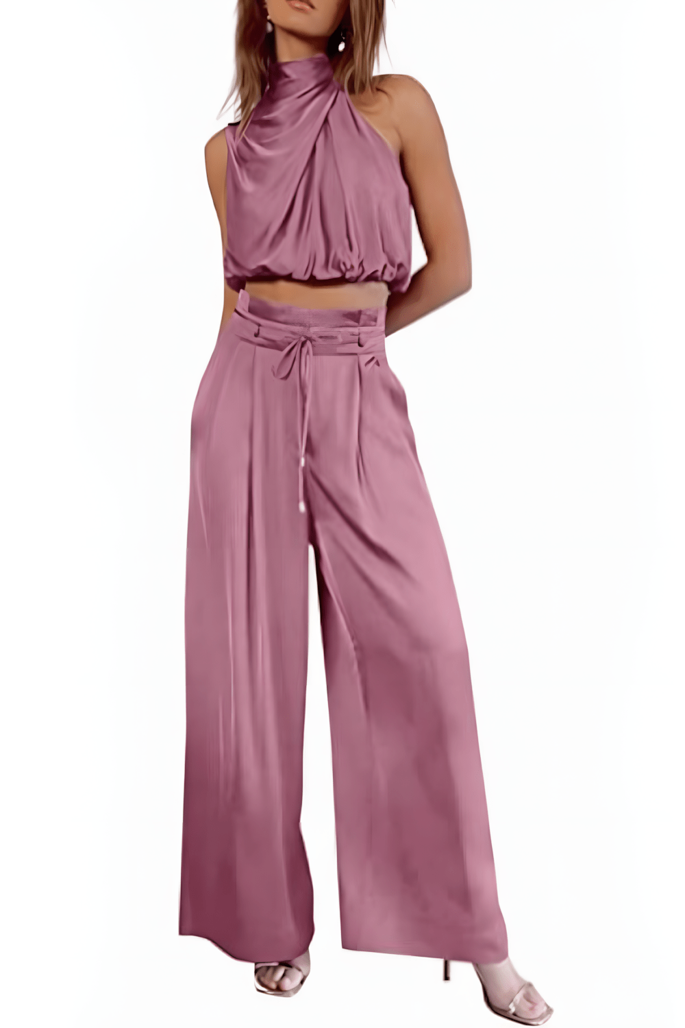 Elegante tweedelige dames set van de zijkant: mouwloze top en wijdvallende broek, comfortabele pasvorm.