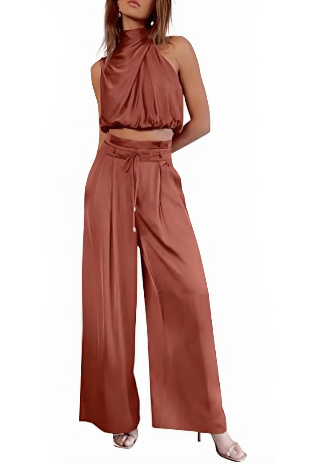 Zomerse tweedelige set voor dames: elegante mouwloze top en wijde broek, perfect voor vakantie en lente.
