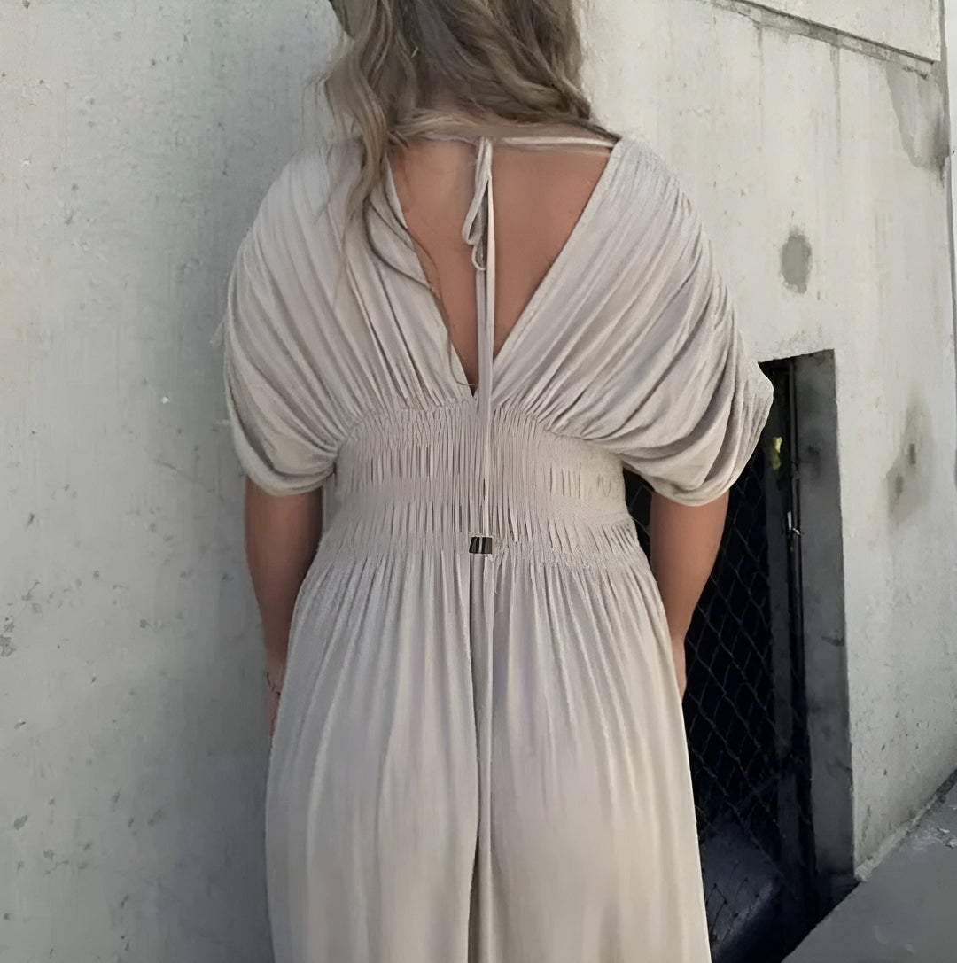 Comfortabele casual dames maxi zomerjurk met V-hals en split. Geschikt voor strand, feest of dagelijks gebruik.