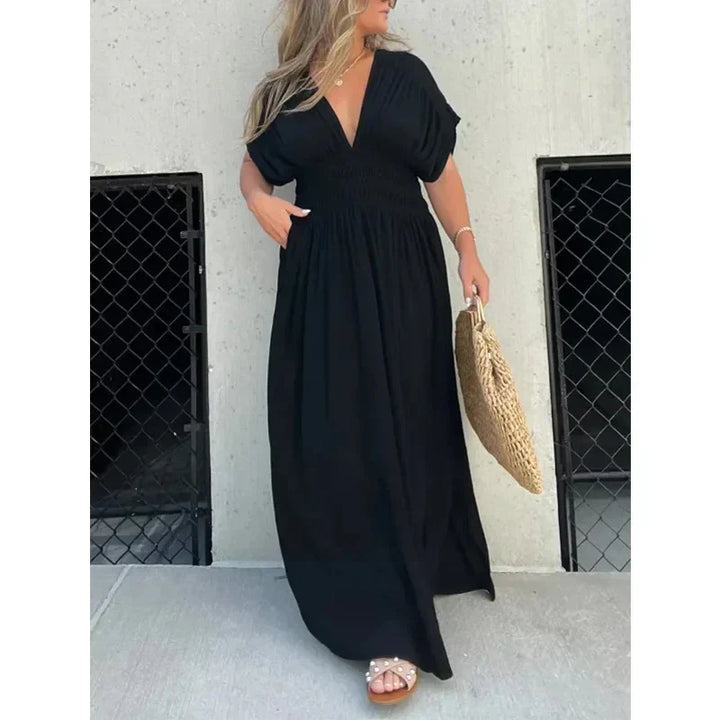 Stijlvolle maxi feestjurk voor dames met V-hals en hoge split. Perfect voor zomeravonden en speciale gelegenheden.