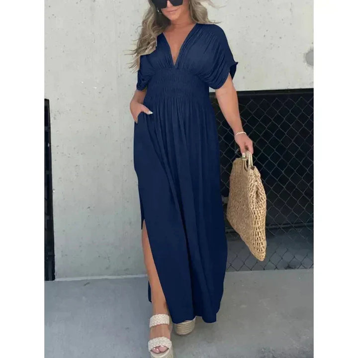 Zomerse dames maxi jurk met V-hals en split; een comfortabele en elegante keuze voor elke dag.