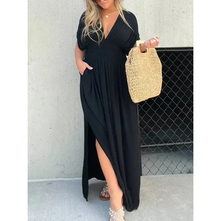 Trendy V-hals maxi zomerjurk voor dames, met een sierlijke split en comfortabele stof. Een modieuze damesjurk.