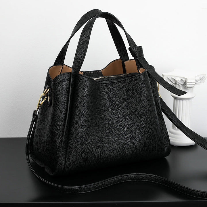 Elegante vegan schoudertas voor dames, gemaakt van duurzaam vegan leer, verkrijgbaar in bruin, groen en zwart.