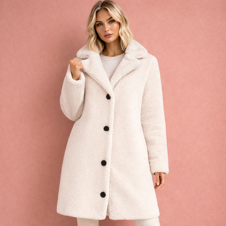 Elegante warme dames winterjas. Stijlvolle lange mantel voor comfort en mode in de koude maanden.