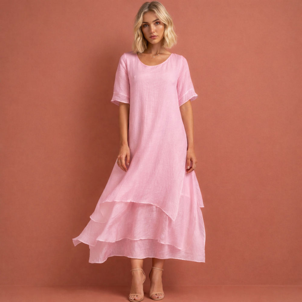 Veelzijdige roze casual midi jurk voor dames met comfortabele ronde hals en speelse volantzoom, ideaal voor lente/zomer.