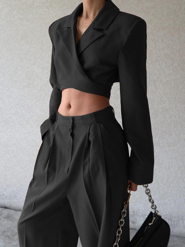 Comfortabele zwarte high waist wijde broek voor dames, uit de tweedelige zomer set met bijpassende blazer.