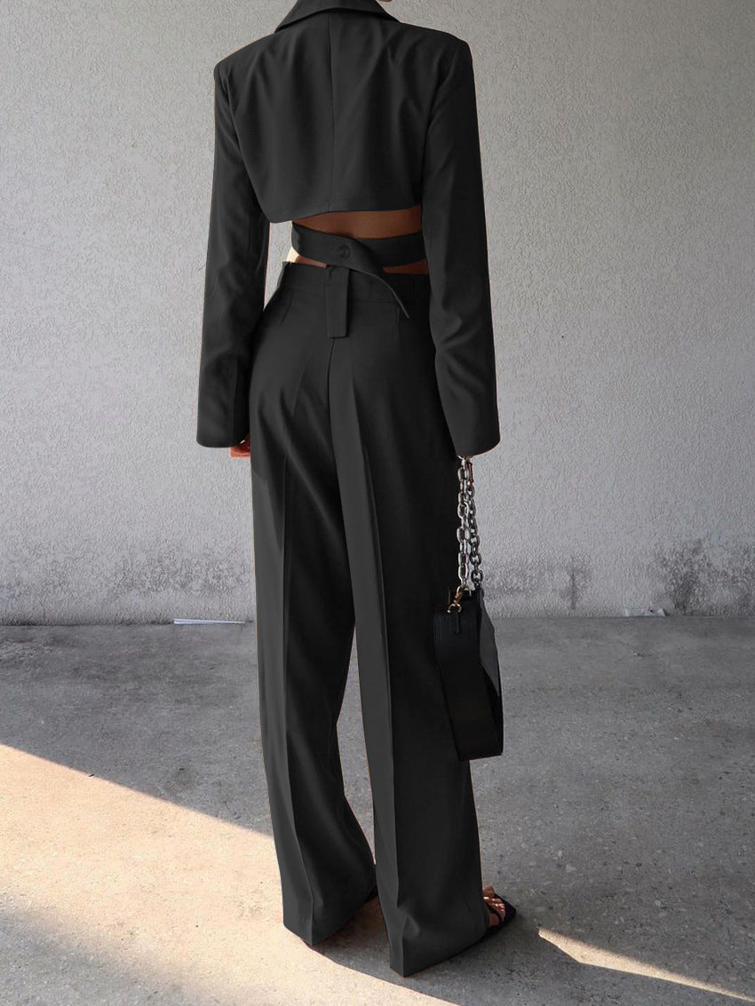 Chique tweedelige dames zomer set: zwarte cropped blazer & high waist wijde broek. Geschikt voor casual en zakelijk.