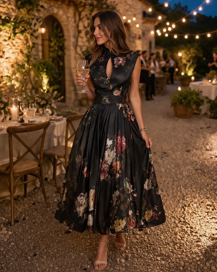 Comfortabele en elegante dames midi jurk met bloemenprint, ideaal als feestjurk of zomerjurk.