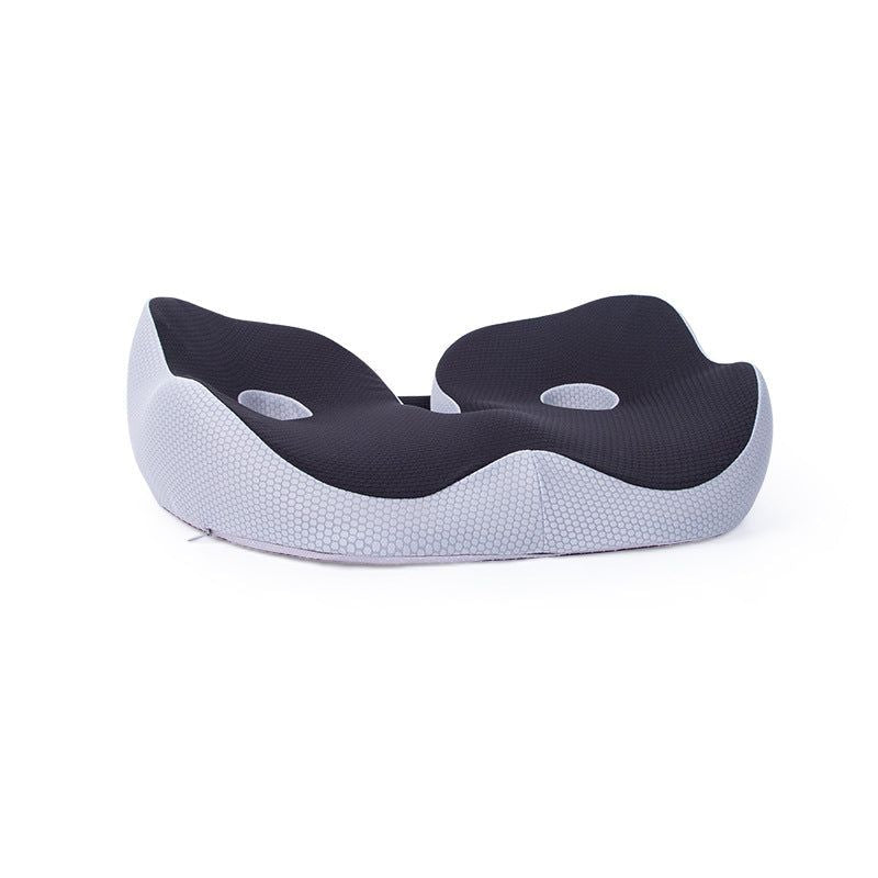 Draagbaar ergonomisch zitkussen met drukverlaging voor bekken en onderrug.