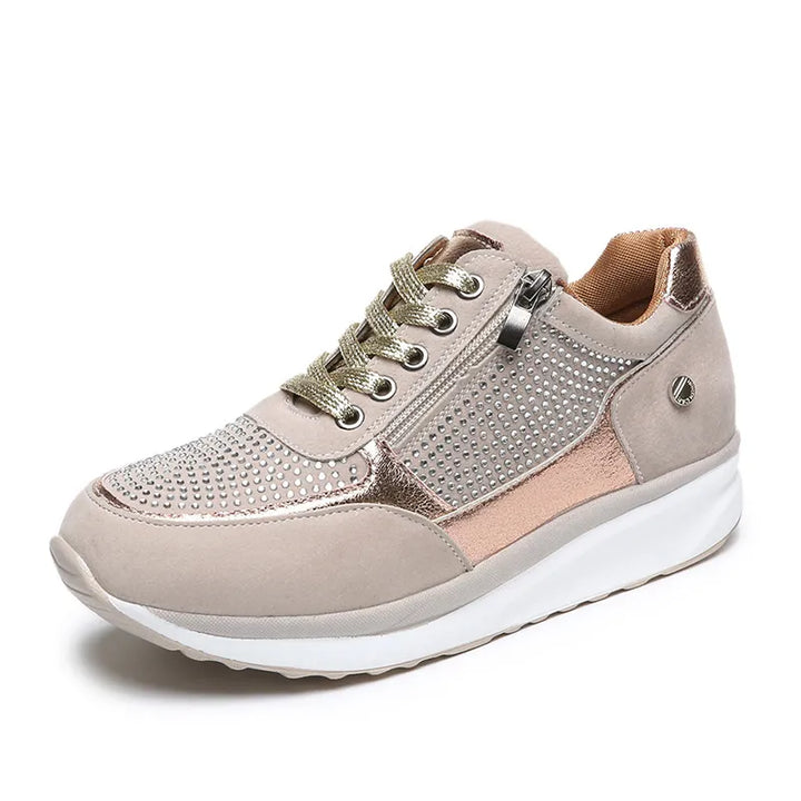 "Ergonomische damessneakers in grijs met ademende materialen, bieden stijl en comfort voor dagelijks gebruik."