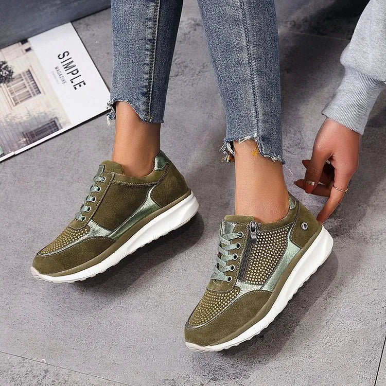 "Ergonomische damessneakers in grijs met ademende materialen, bieden stijl en comfort voor dagelijks gebruik."