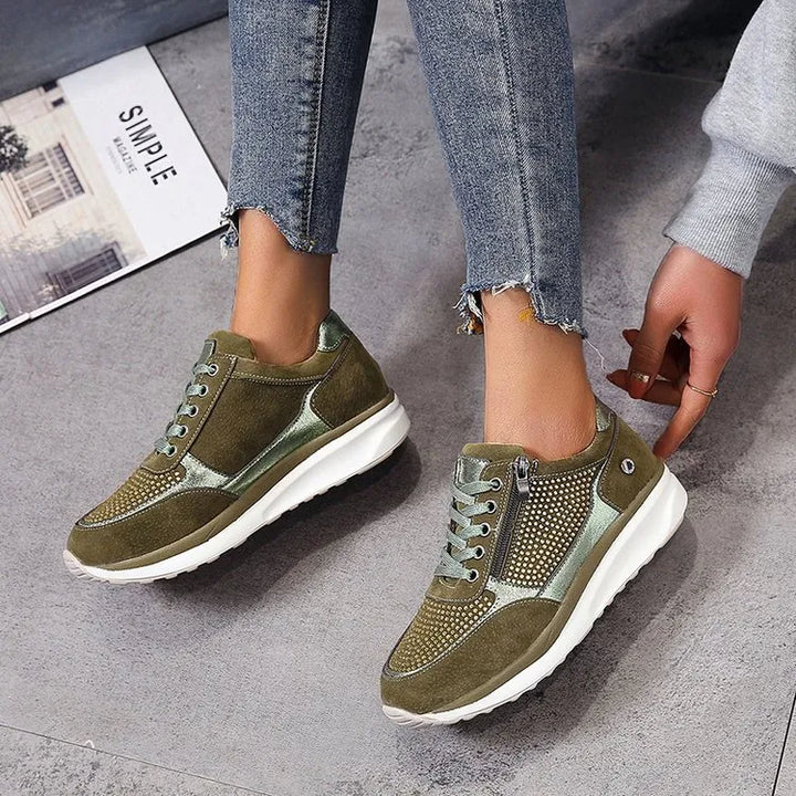"Ergonomische damessneakers in grijs met ademende materialen, bieden stijl en comfort voor dagelijks gebruik."