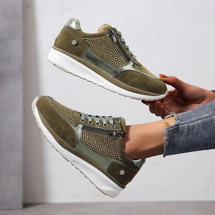 "Ergonomische damessneakers in grijs met ademende materialen, bieden stijl en comfort voor dagelijks gebruik."
