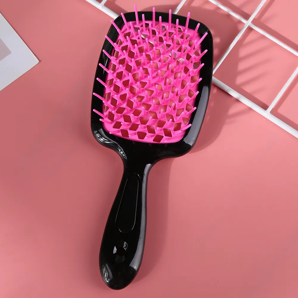 "Ergonomische ontwarring borstel met luchtkussen, bevordert snelle droging en pijnloze knoopverwijdering voor alle haartypes.