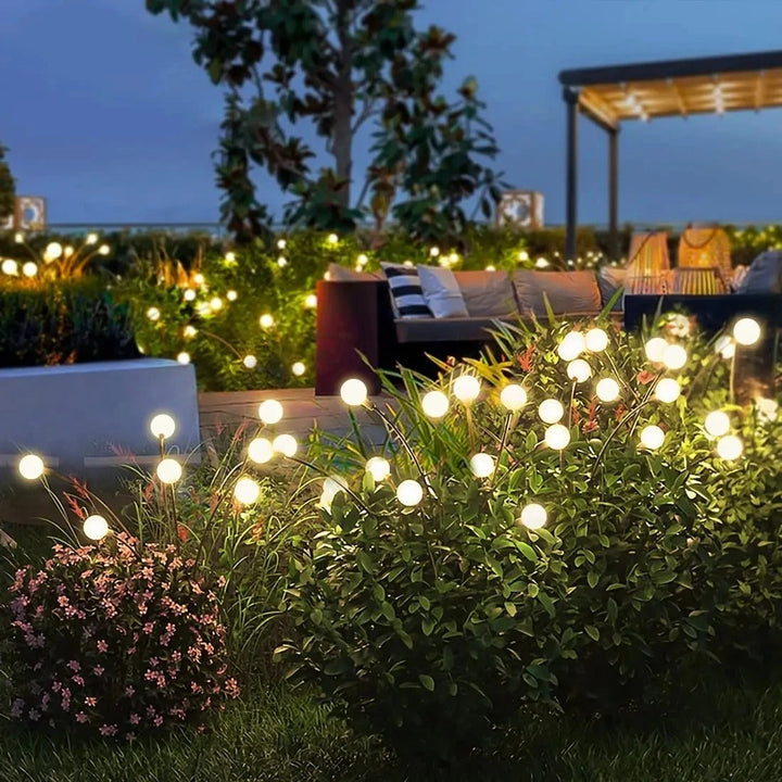 "Flexibele LED tuinverlichting met vuurvliegjes effect, op zonne-energie, buigbare stelen, warm wit licht, waterbestendig IP6
