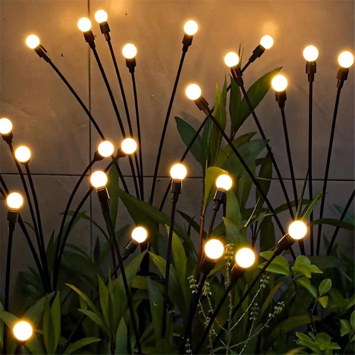 "Flexibele LED tuinverlichting met vuurvliegjes effect, op zonne-energie, buigbare stelen, warm wit licht, waterbestendig IP6