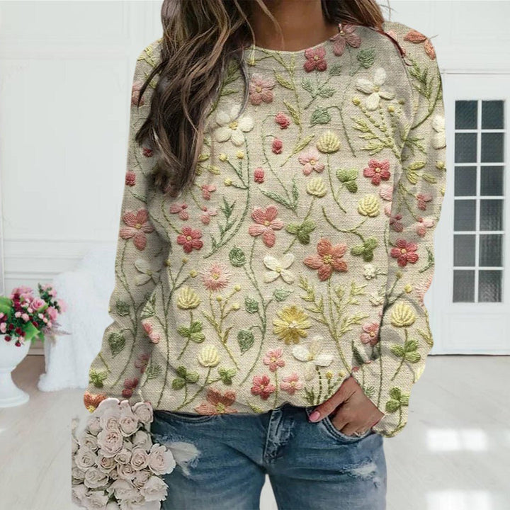 Gebloemde damestrui met ronde hals, perfect voor casual herfst- en wintermode. Comfortabel, chic en trendy.