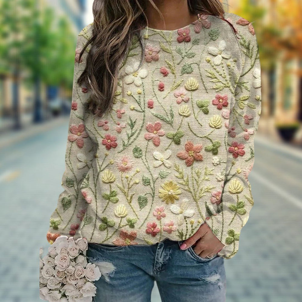 Veelzijdige dames gebloemde trui met lange mouwen en ronde hals. Ideaal voor een comfortabele en trendy herfstlook.