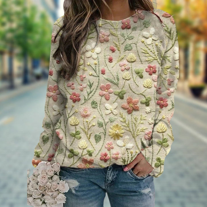 Veelzijdige dames gebloemde trui met lange mouwen en ronde hals. Ideaal voor een comfortabele en trendy herfstlook.