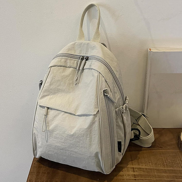 Georganiseerde unisex rugzak, geel en waterdicht, ideaal voor school, reizen en pendelen.