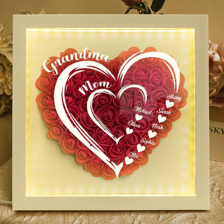 Gepersonaliseerd bloemen schaduwdoos licht met namen, perfect als Moederdag cadeau of interieurdecoratie.