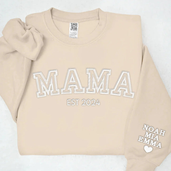 Borduurtrui met familenamen, een blijvend Moederdag cadeau.