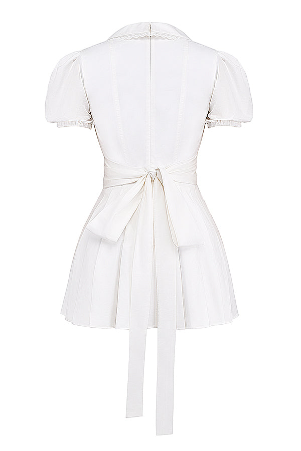 Veelzijdige dames mini-jurk: geplooid, met V-hals en pofmouwen. Draag hem casual of als elegante feestjurk.