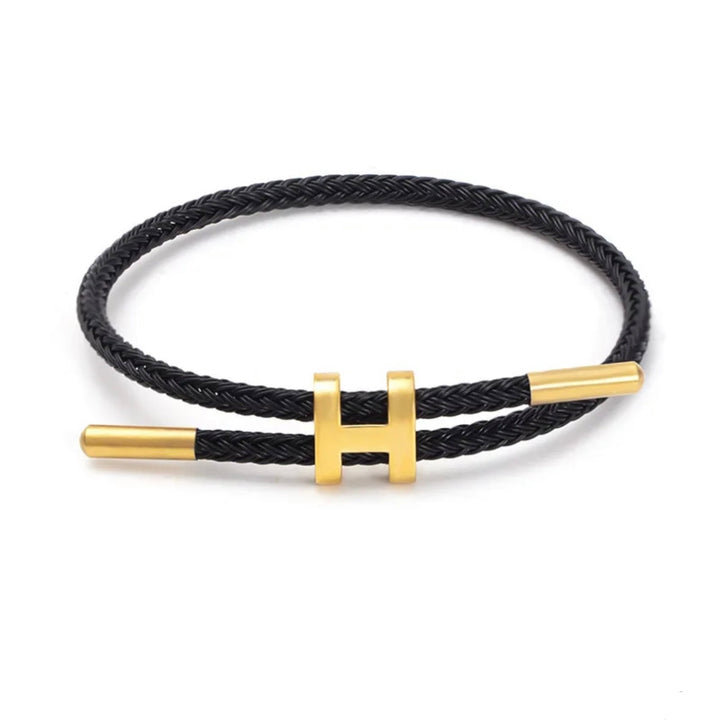 Gevlochten unisex armband met elegante H-sluiting. Modern en tijdloos sieraad, perfect voor elke stijl.