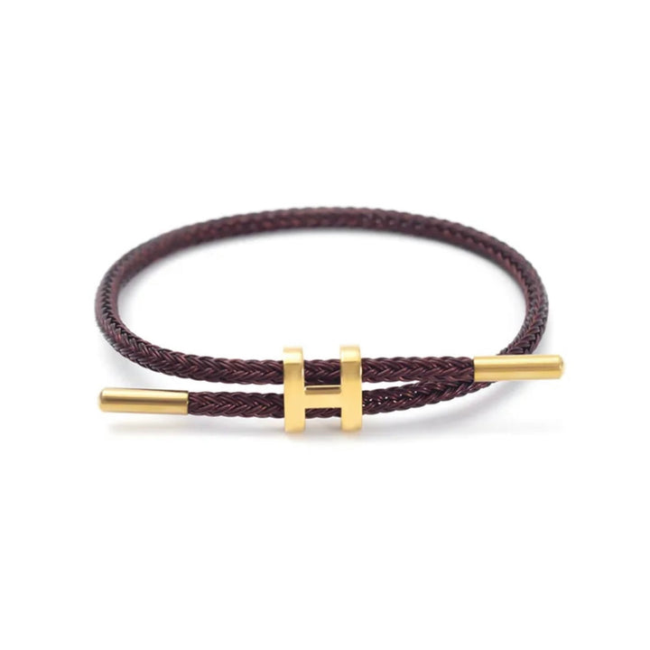 Gevlochten unisex sieraad armband met elegante H-sluiting. Een modern touw accessoire voor elke outfit.