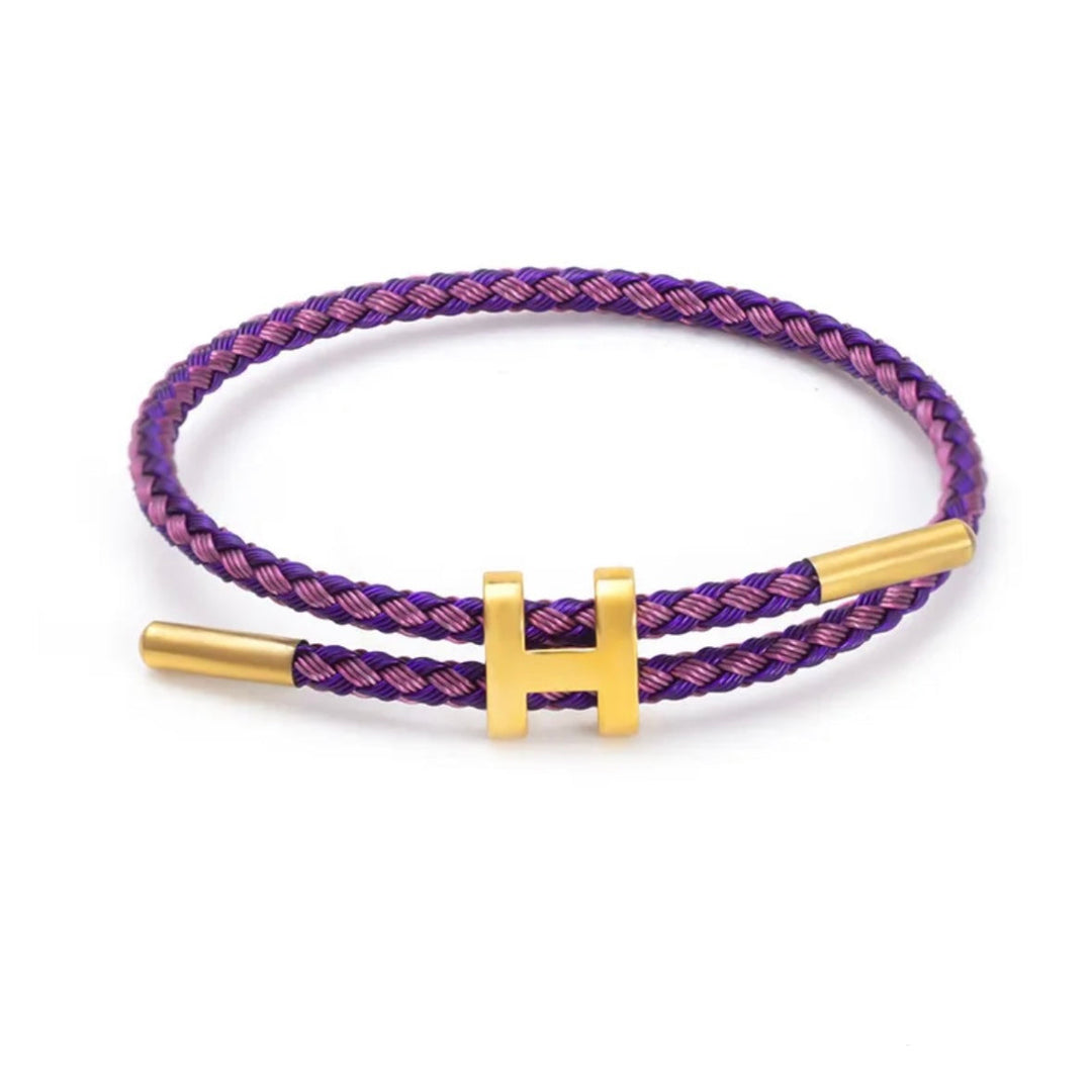 Hoogwaardige gevlochten unisex armband met strakke H-sluiting, voor een elegante en moderne look. Sieraad.