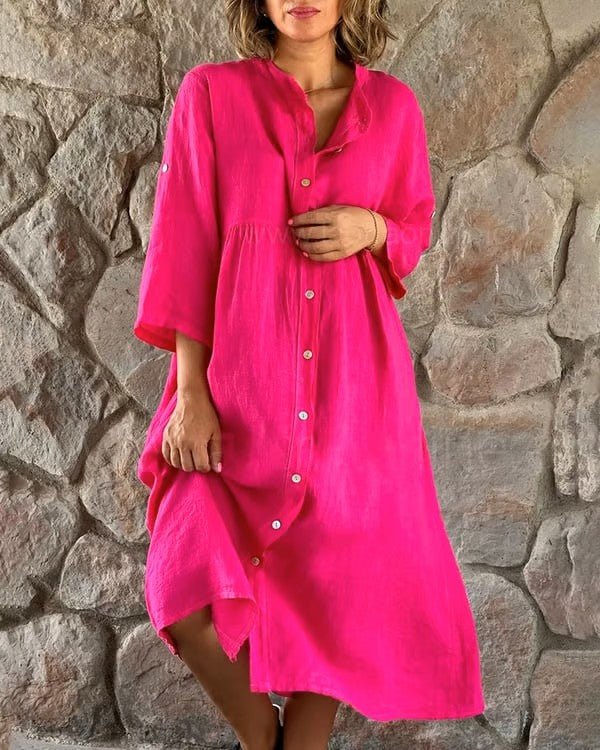 Elegante roze midijurk voor dames met 3/4 mouw. Deze veelzijdige zomerjurk is luchtig, comfortabel en flatterend.
