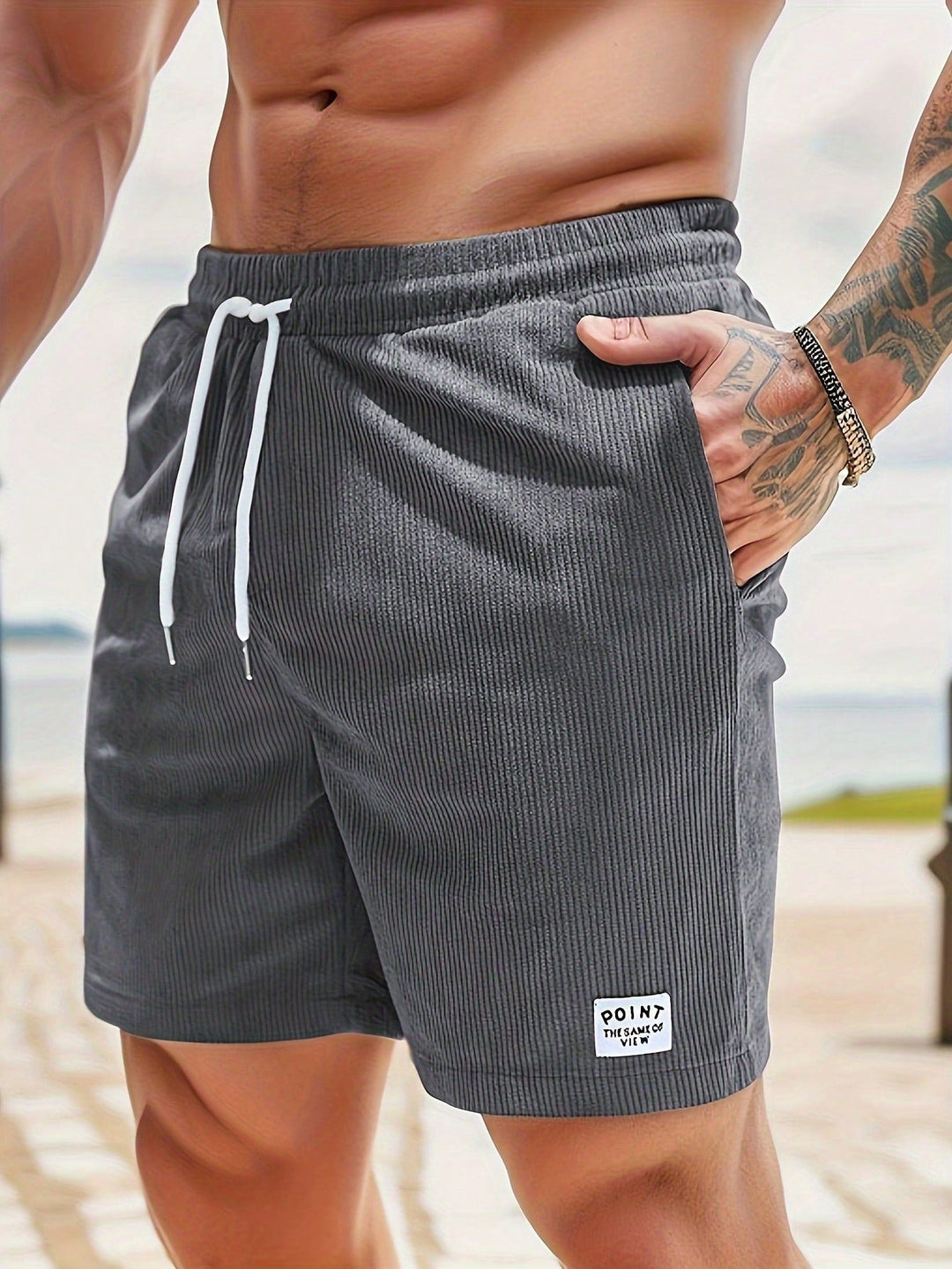 Zwarte heren zomershorts, comfortabele relaxte pasvorm met trekkoord en elastische taille.