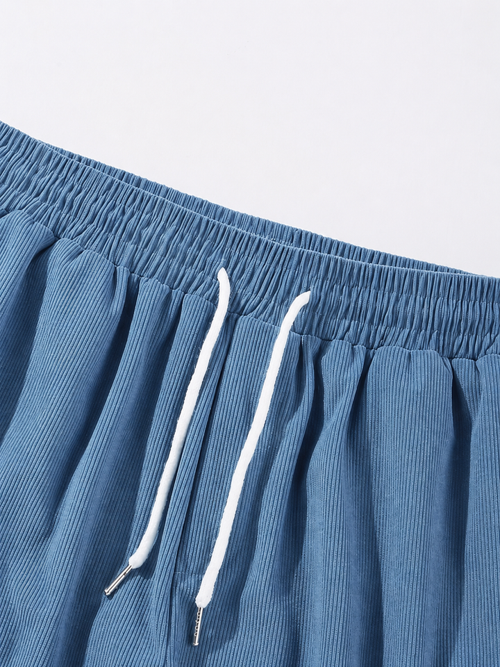 Zomershorts voor heren: groen, met elastische taille en trekkoord, voor ultiem comfort en stijl.